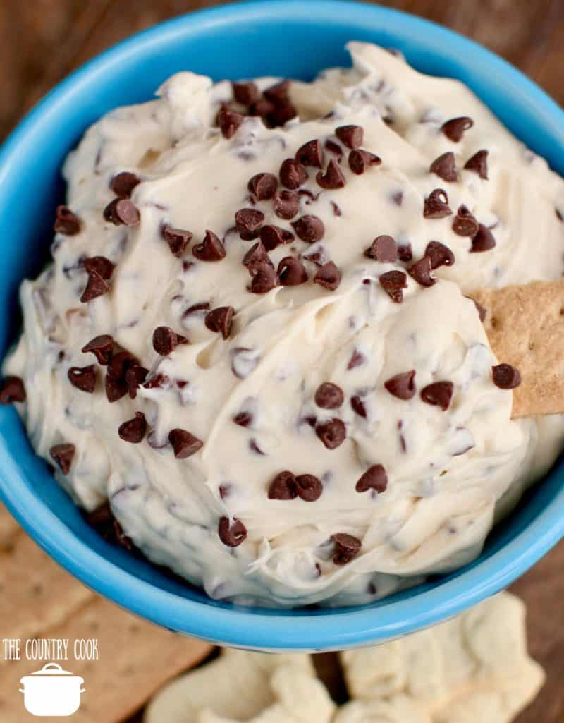 Chocolate Chip Cookie Dough Dip recipe with honey graham crackers and animal crackers in a blue bowl