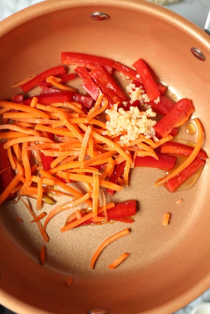 julienned carrots, sliced red peppers, garlic sautéed in sesame oil.