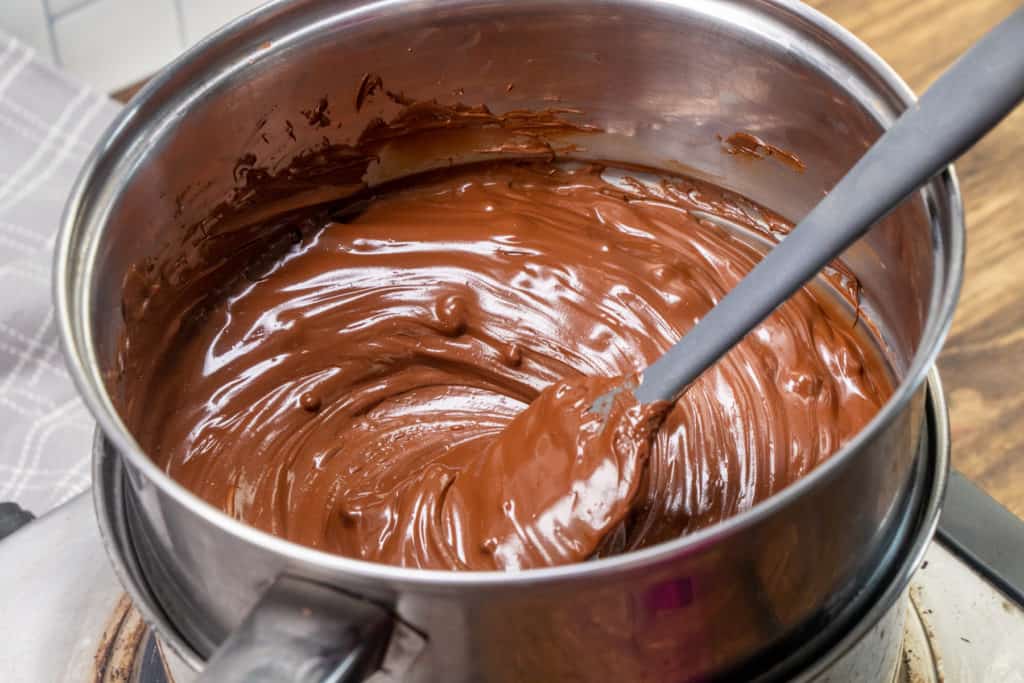 melted semi sweet chocolate in a double boiler pot.