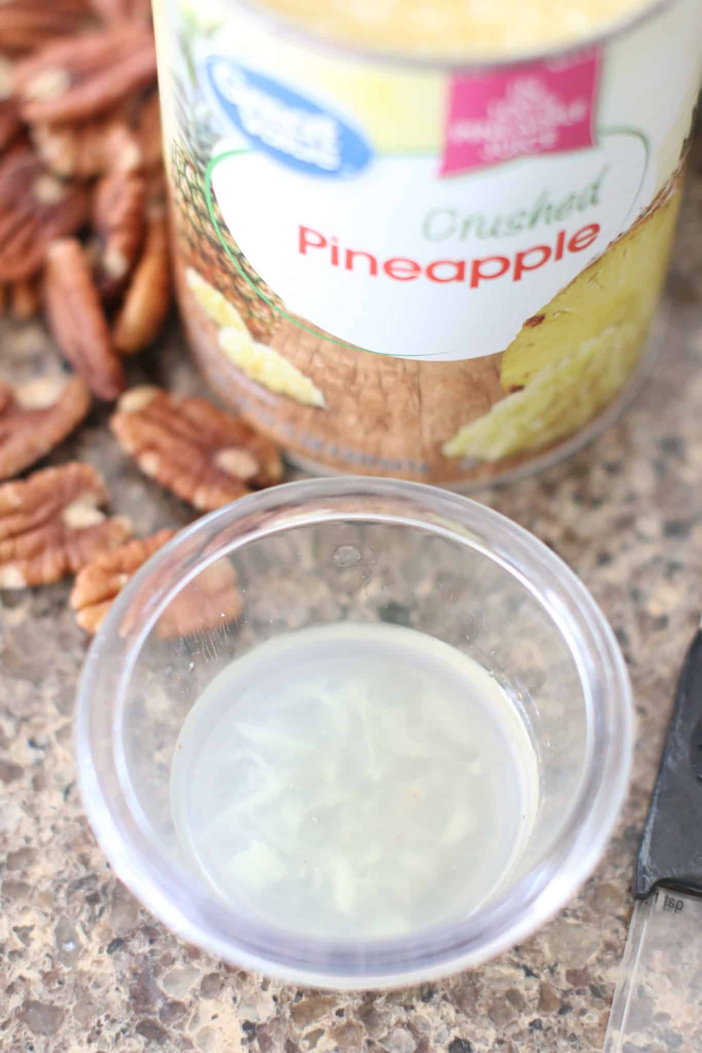 reserve 4 teaspoons pineapple juice