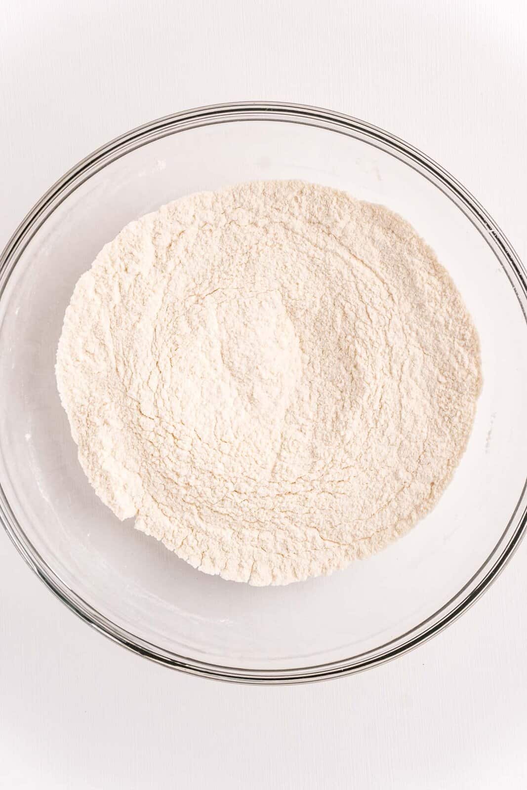 flour, sugar, salt and baking powder in a bowl.