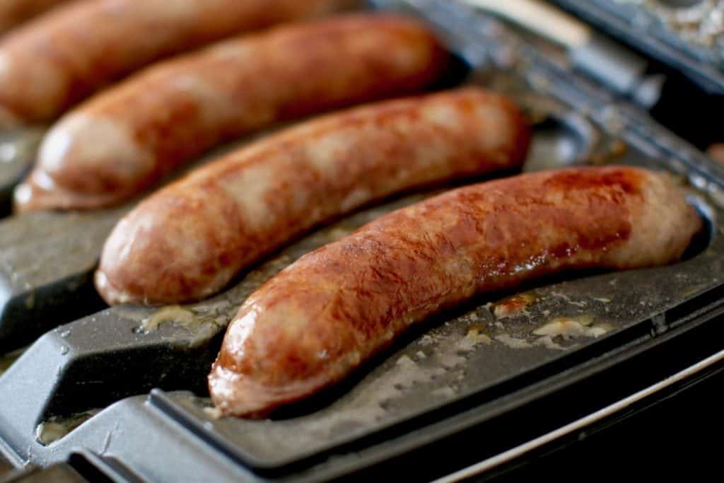 cooked bratwurst on Johnsonville Sizzling Sausage Grill