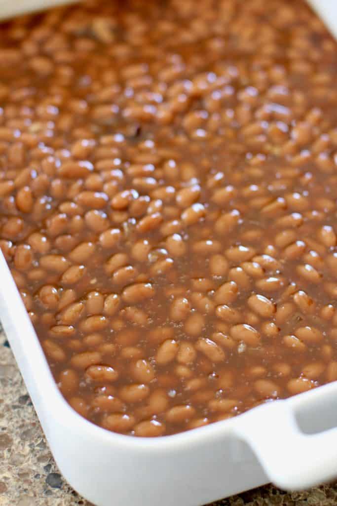 canned baked beans in a 9x13 baking dish