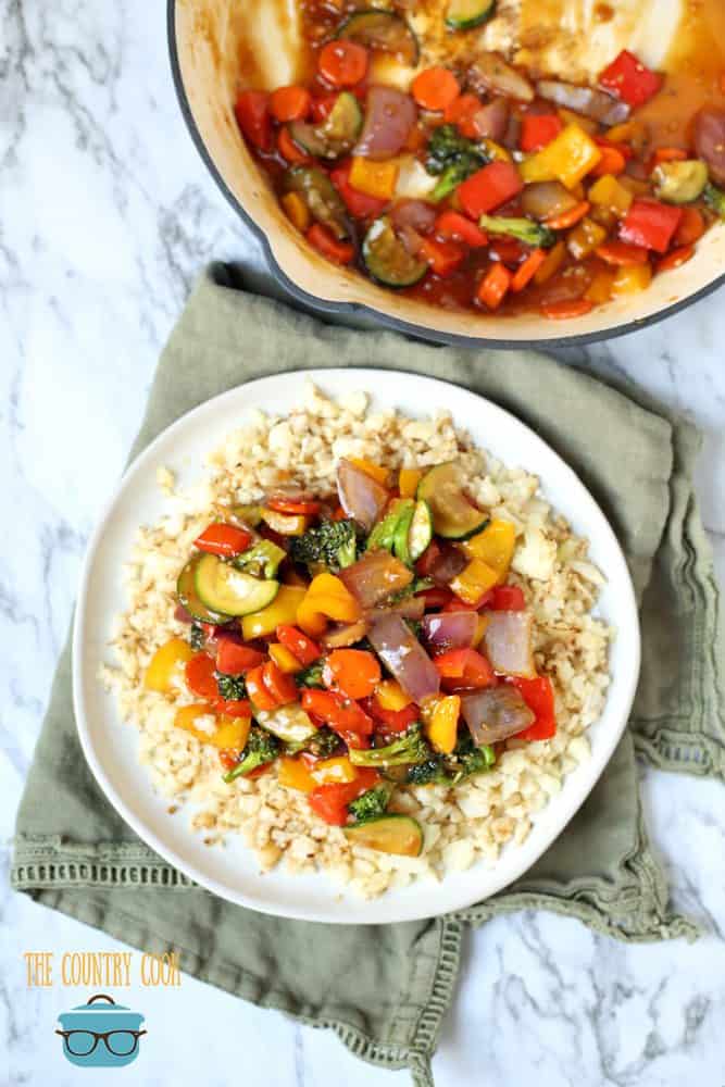 low carb cauliflower rice stir fry with vegetables and homemade sauce