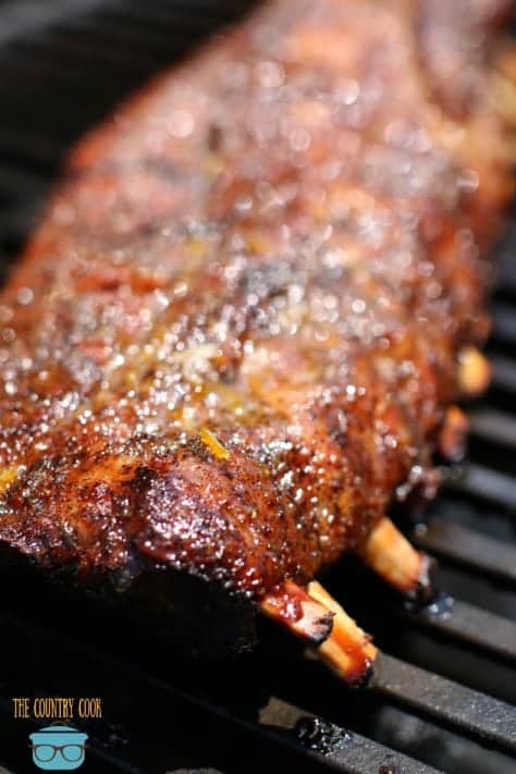 Pork Ribs on the gas grill covered with a glaze and finishing cooking.