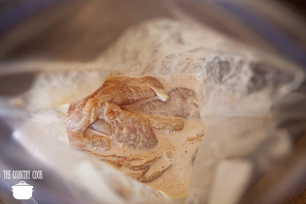 chicken tenders marinating in a ziploc bag