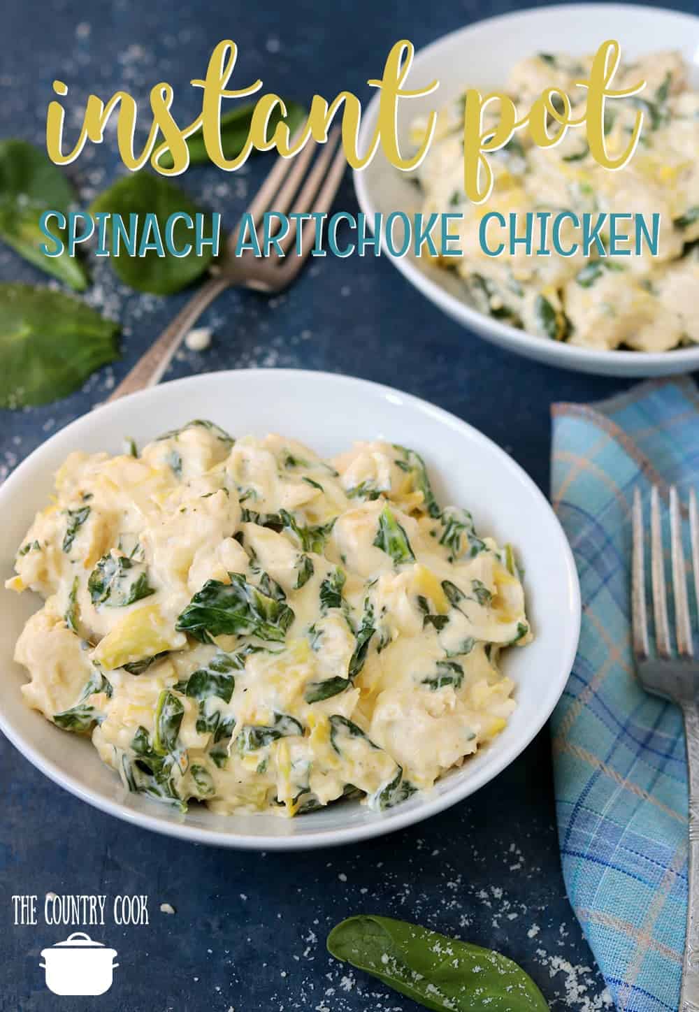 Two bowls of spinach artichoke chicken. 