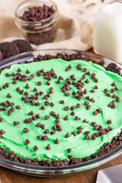 mini chocolate chips added on top of grasshopper pie.