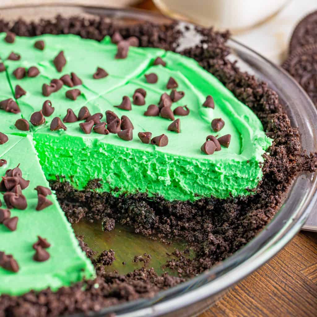 grasshopper pie in a pan that shows one slice removed.
