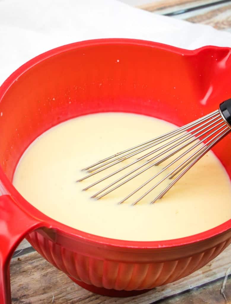 warmed vanilla sauce whisk together in a microwaveable bowl.