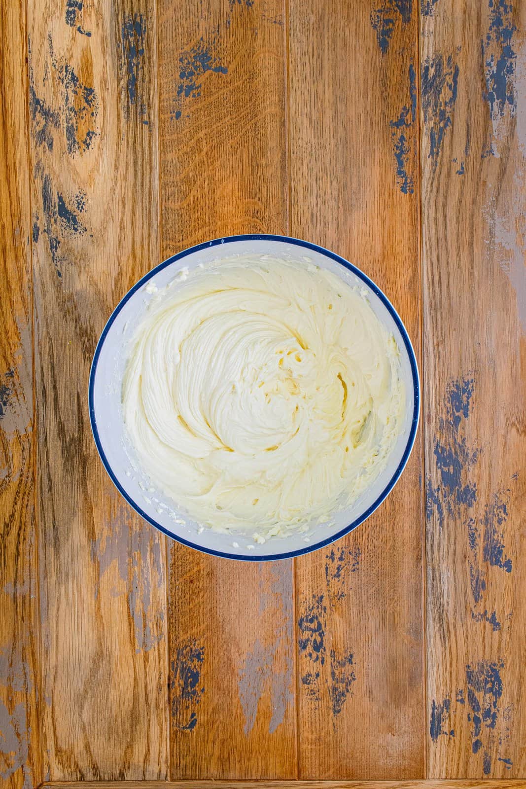 buttercream frosting in a white bowl.