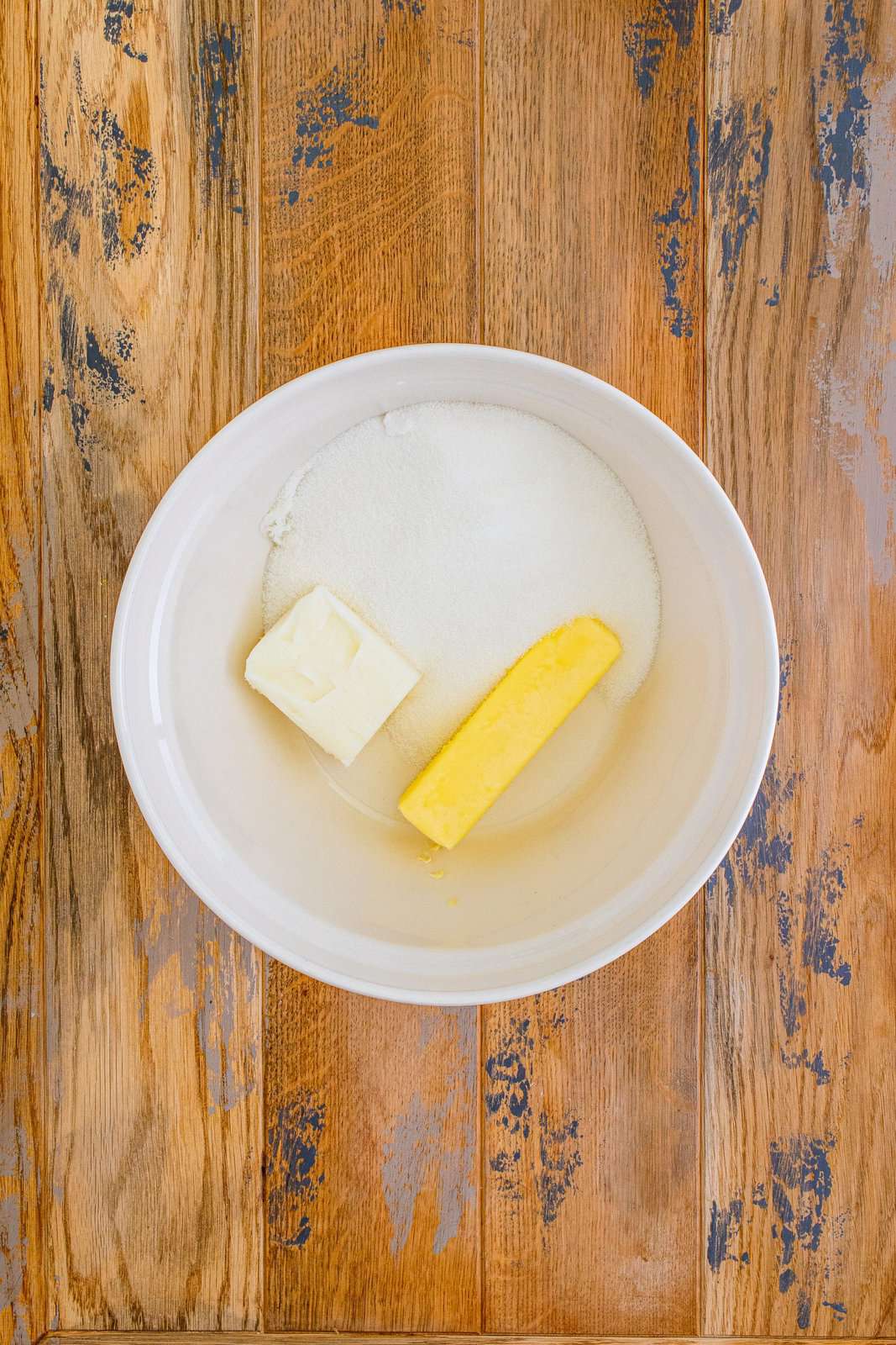 butter, shortening and sugar in a white bowl.