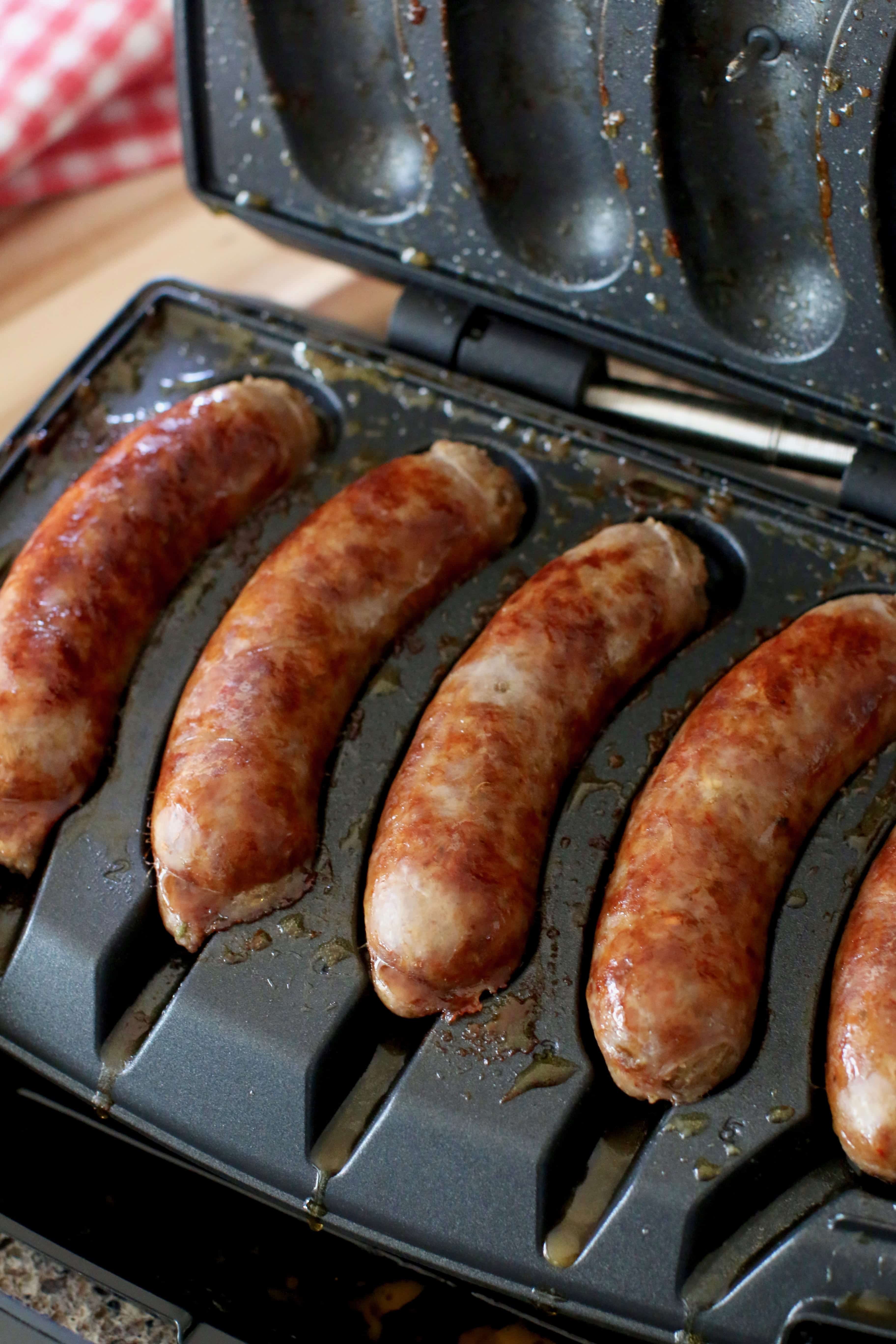 cooked Italian sausages in Johnsonville Sizzling Sausage Grill.