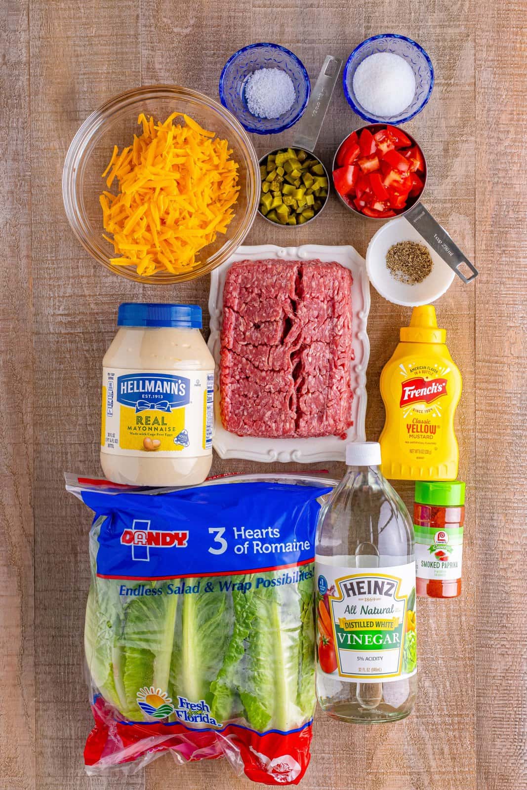 ground beef, mayonnaise, mustard, vinegar, smoked paprika, diced pickle, romaine lettuce, diced tomatoes.
