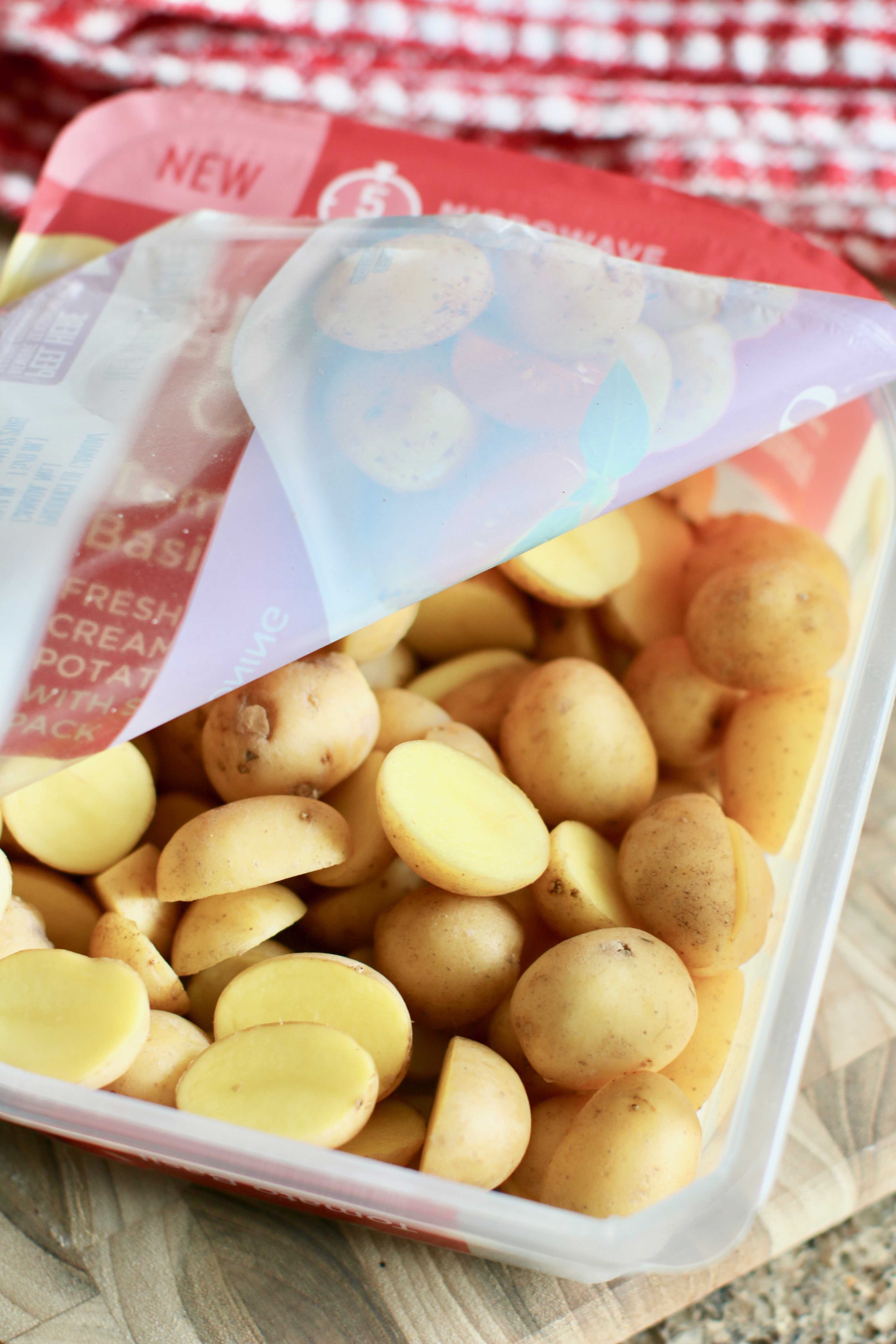 sliced potatoes in microwaveable packaging.