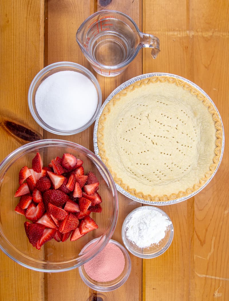 frozen pie crust, water, sugar, cornstarch, strawberry jell-o, fresh strawberries.