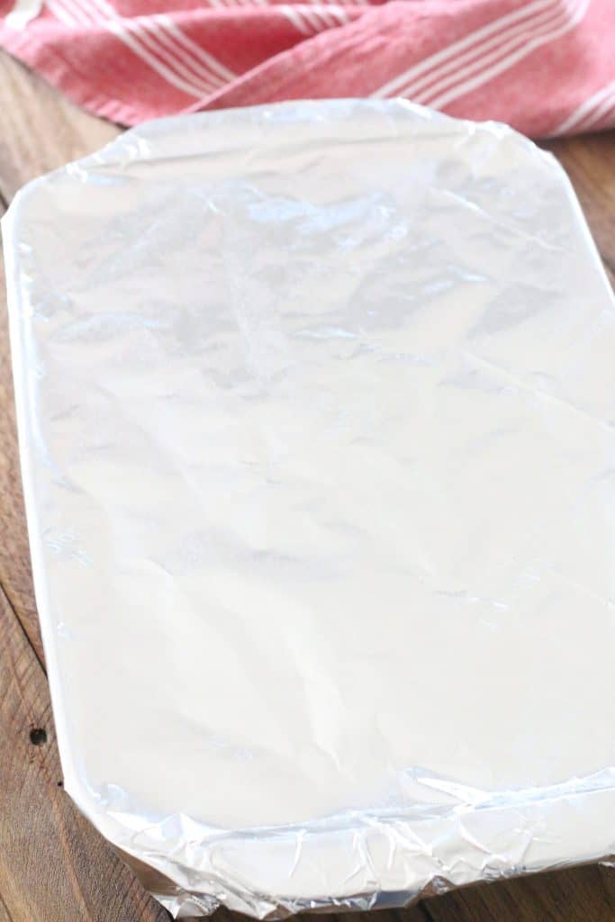 baking dish shown covered in aluminum foil