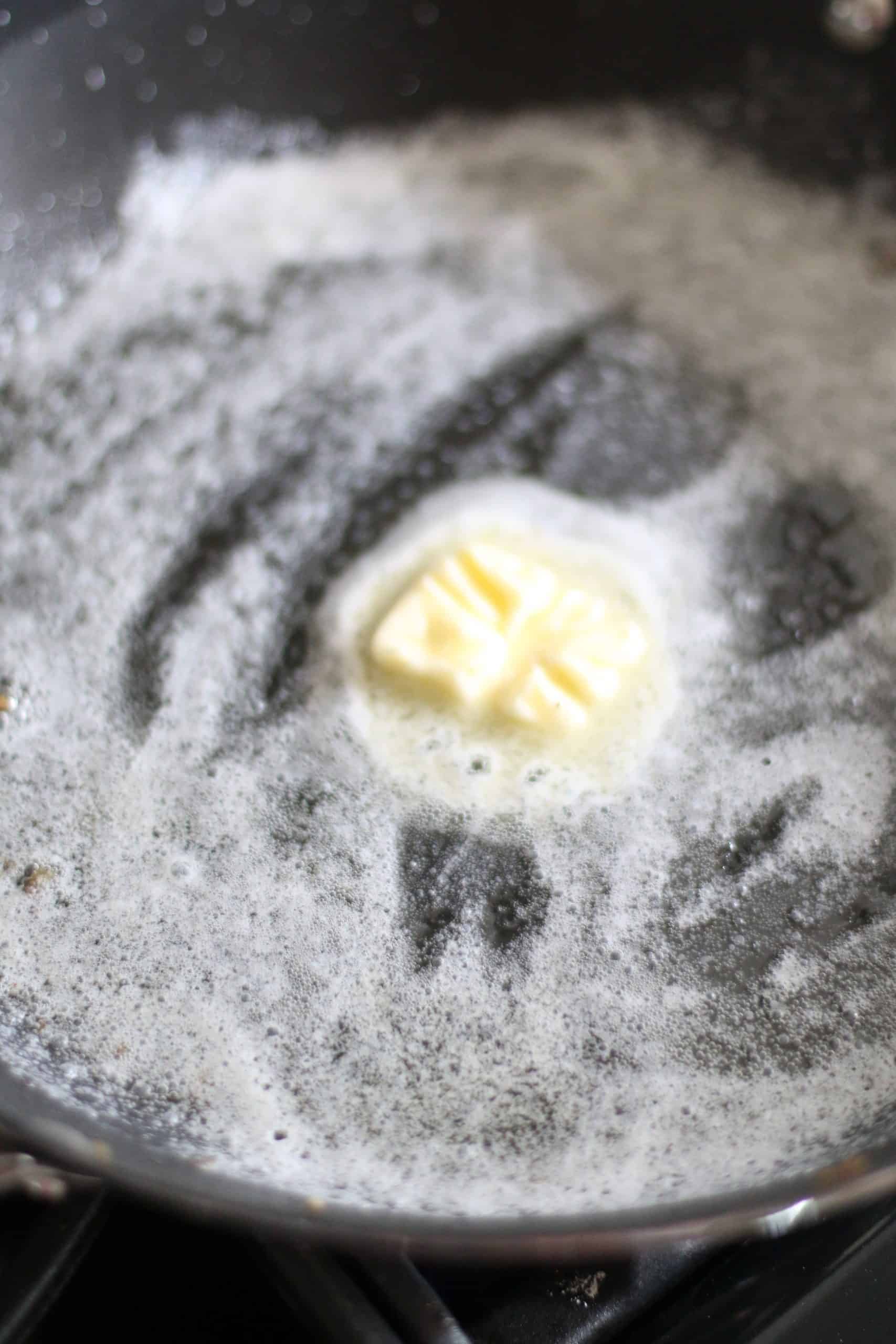 melting butter in a skillet.