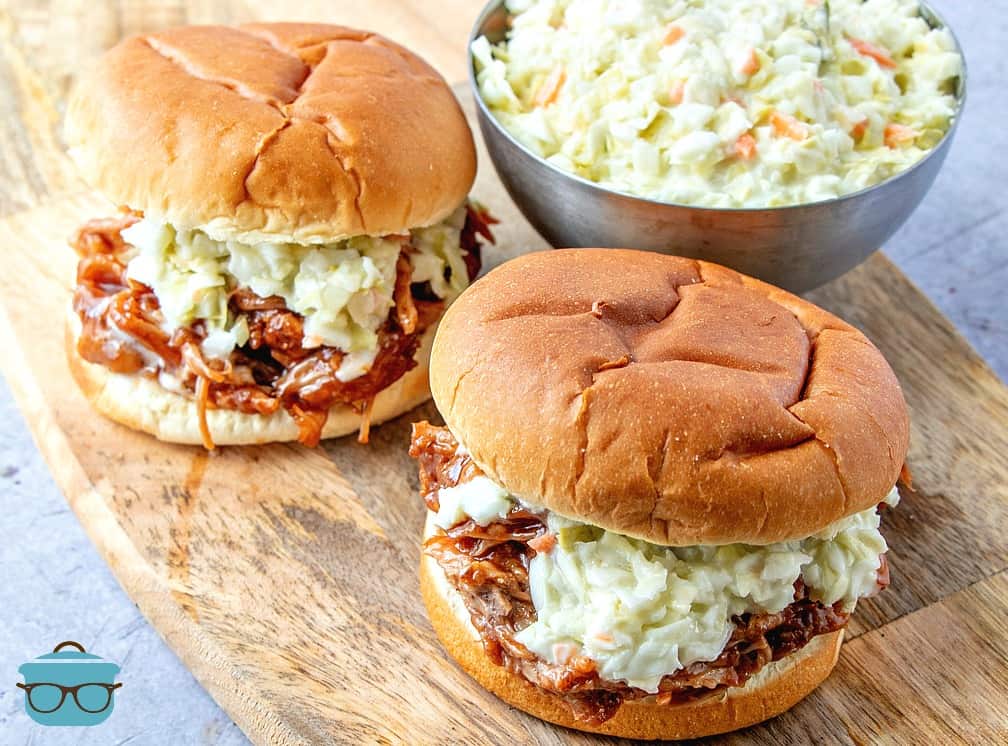 Instant Pot Pulled Pork BBQ topped with Cole slaw on buns