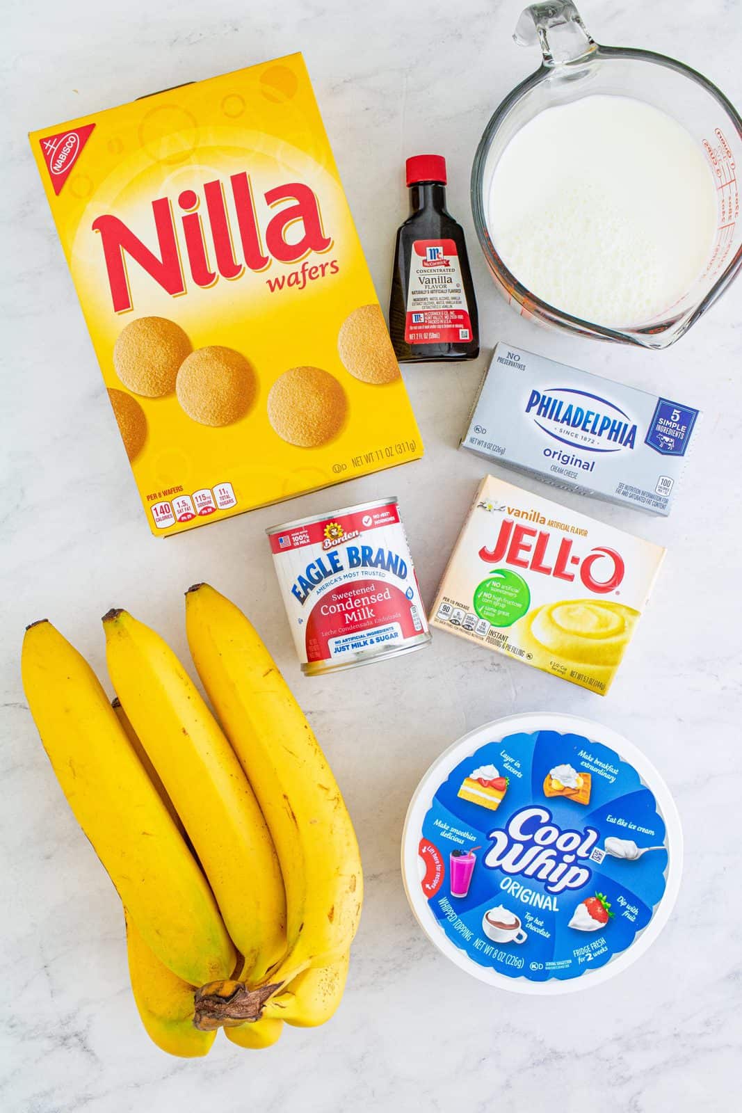 Banana Pudding ingredients: cream cheese, sweetened condensed, milk, instant vanilla pudding, milk, vanilla extract, Cool Whip, Nilla wafers, ripe bananas.