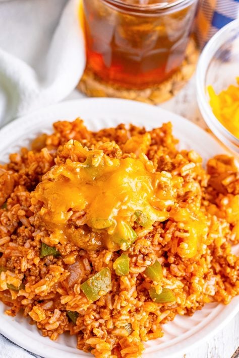 A few large servings of Spanish Rice on a plate.