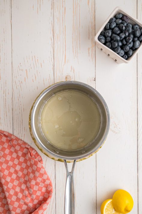 A pan with lemon juice and sugar.