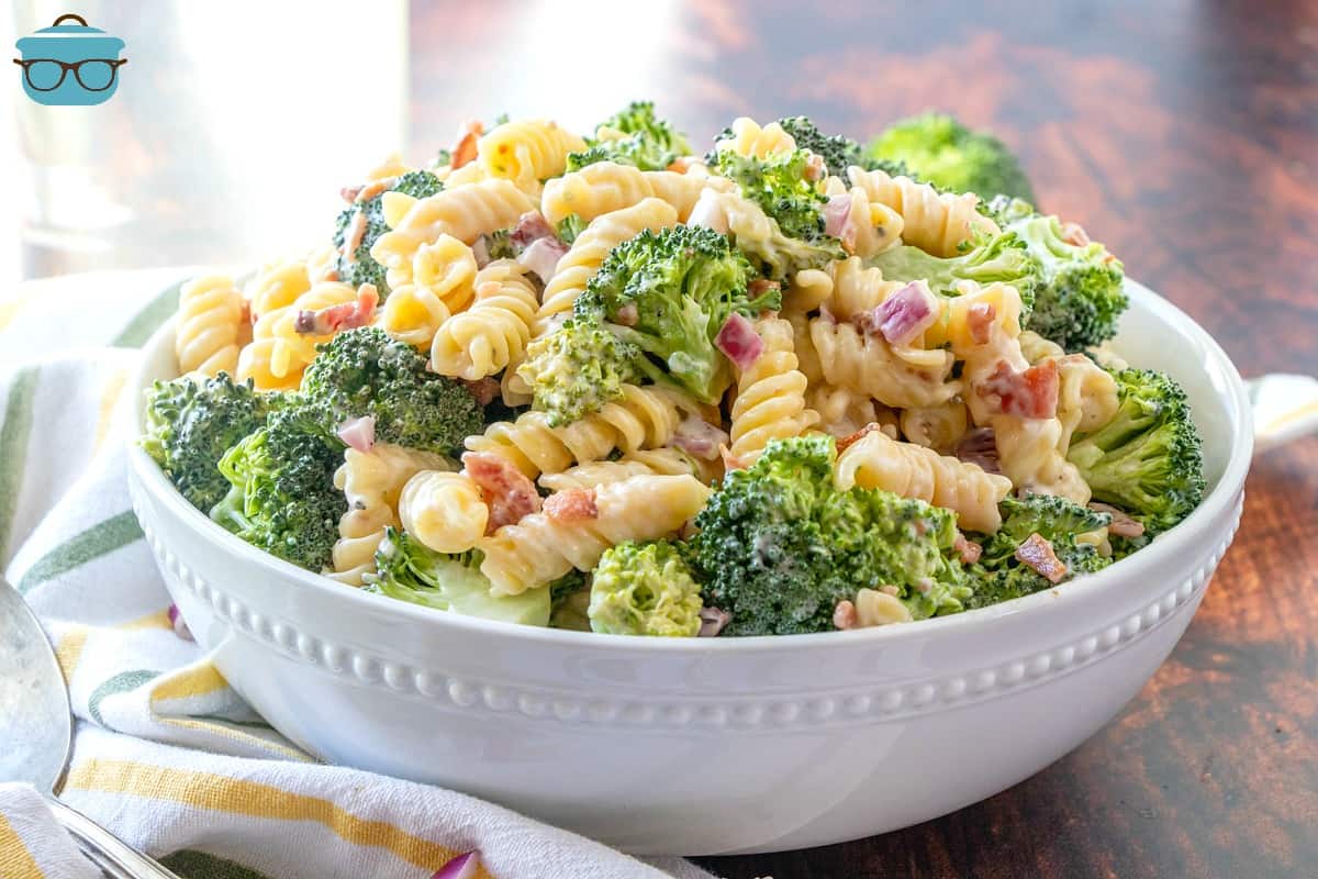 Creamy Bacon Broccoli Pasta Salad in a white serving bowl.