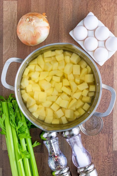 diced gold potatoes in a large pot of water
