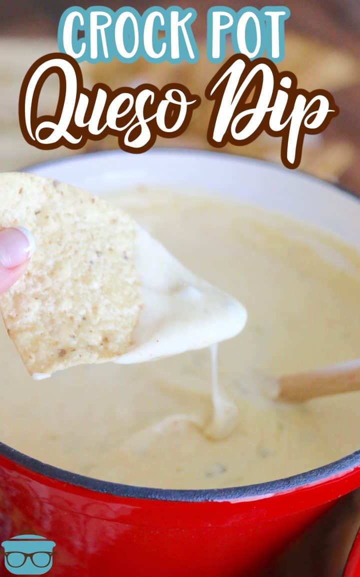 White Queso Dip shown in a small red slow cooker. 