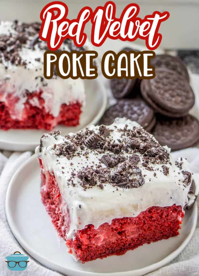 two slices of Red Velvet Pudding Poke Cake on two small round plates with Oreo cookies in the background.