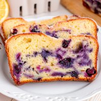 A few slices of Blueberry Lemon Bread on a plate.