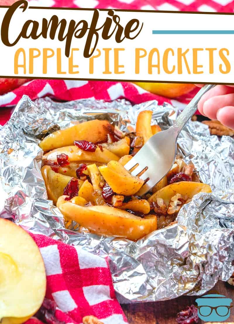 Campfire Apple Pie Packets recipe from The Country Cook, pictured cooked in aluminum foil and served with a fork.