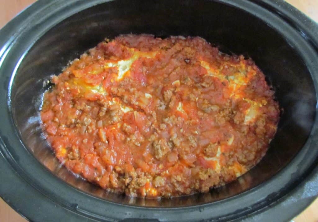 fully cooked lasagna in 5-quart oval slow cooker.