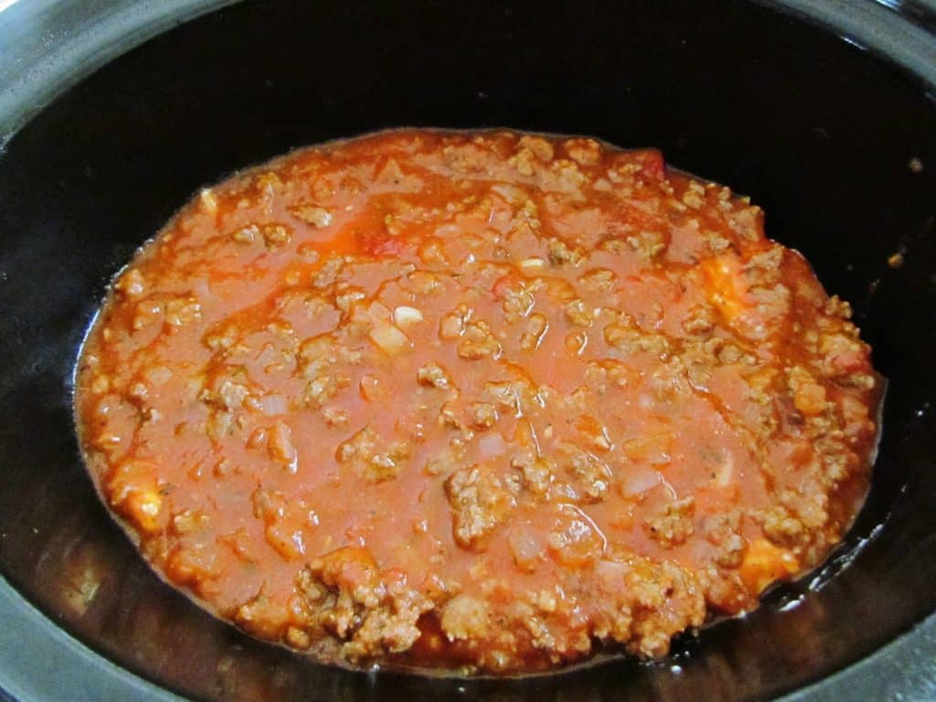 final meat sauce layer in crock pot.