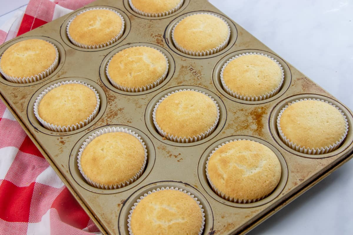 fully baked cupcakes in a cupcake pan.