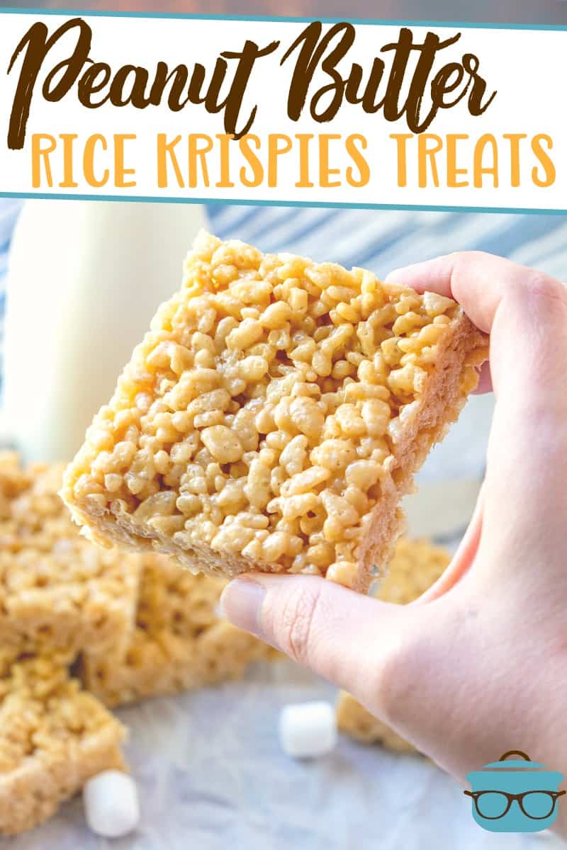 Peanut Butter Rice Krispies treats recipe from The country Cook, pictured with hand holding a Rice Krispies treats bar with a bottle of milk in the background