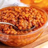 A big glass bowl of Southern Baked Beans.