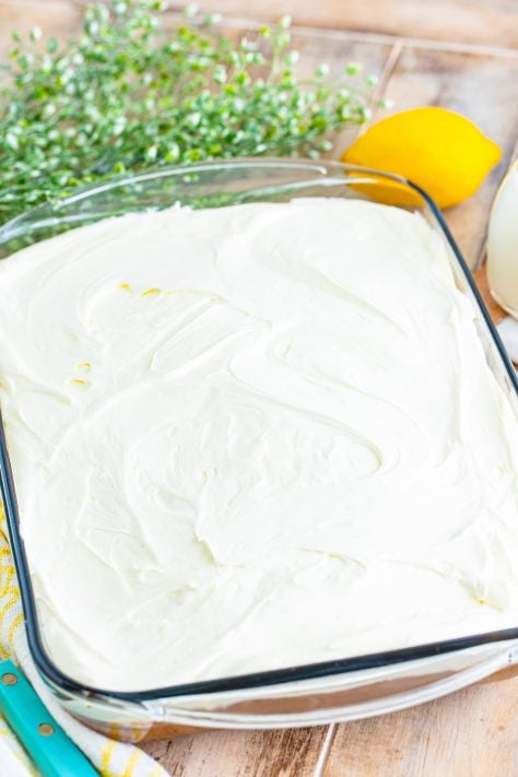 Iced Lemon Dream Cake in a baking dish.