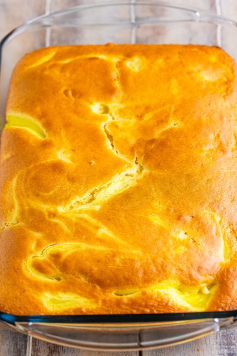 An unfrosted, fresh baked Lemon Dream Cake.