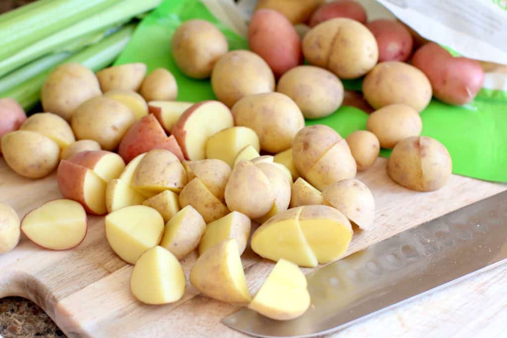 sliced Dynamic Dup Little Potatoes on a cutting board