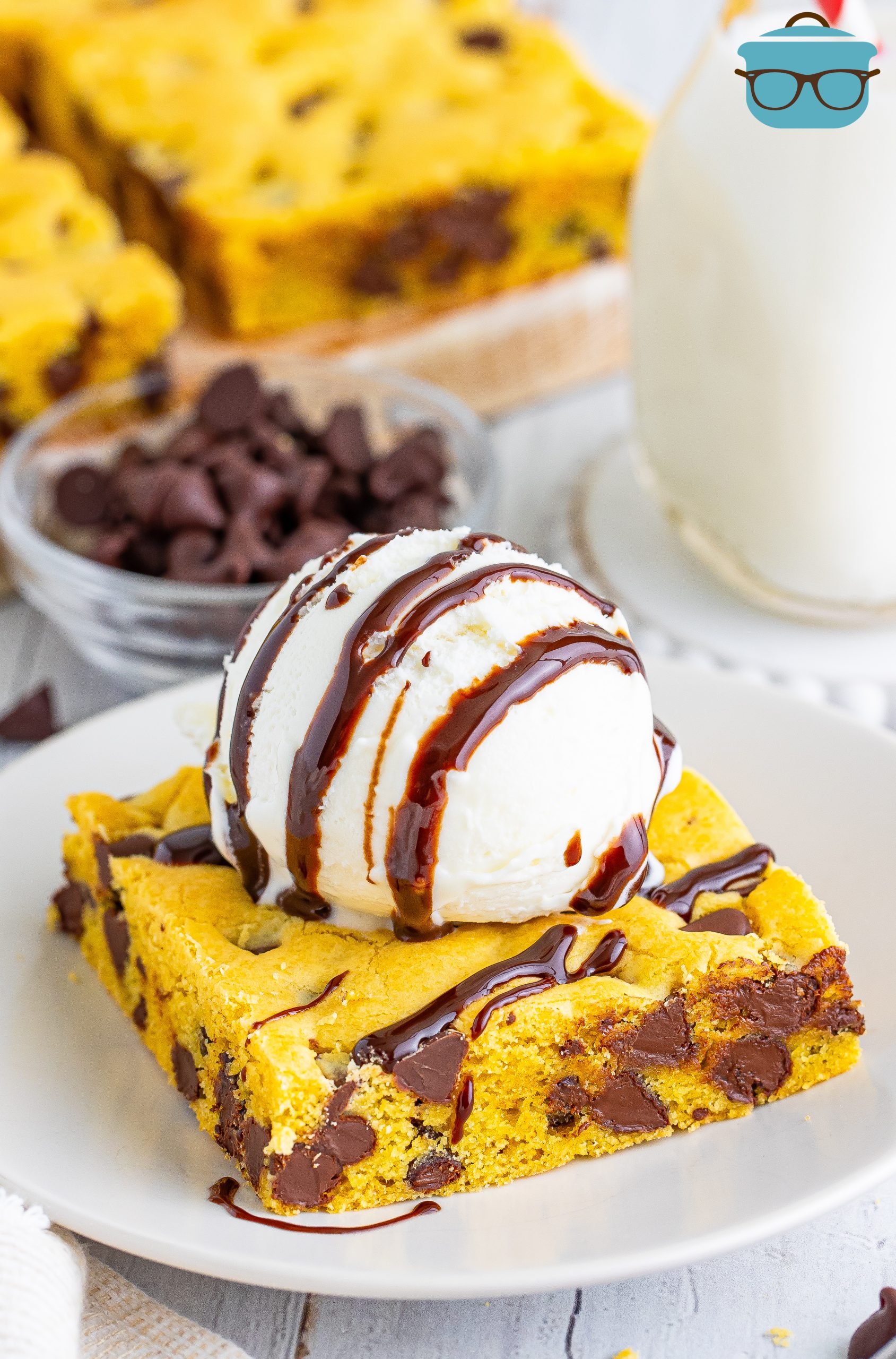 A Lazy Chocolate Chip Cookie Bar with ice cream and chocolate sauce.