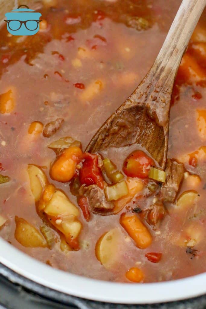 thickened, Instant Pot Beef Stew with wooden spoon