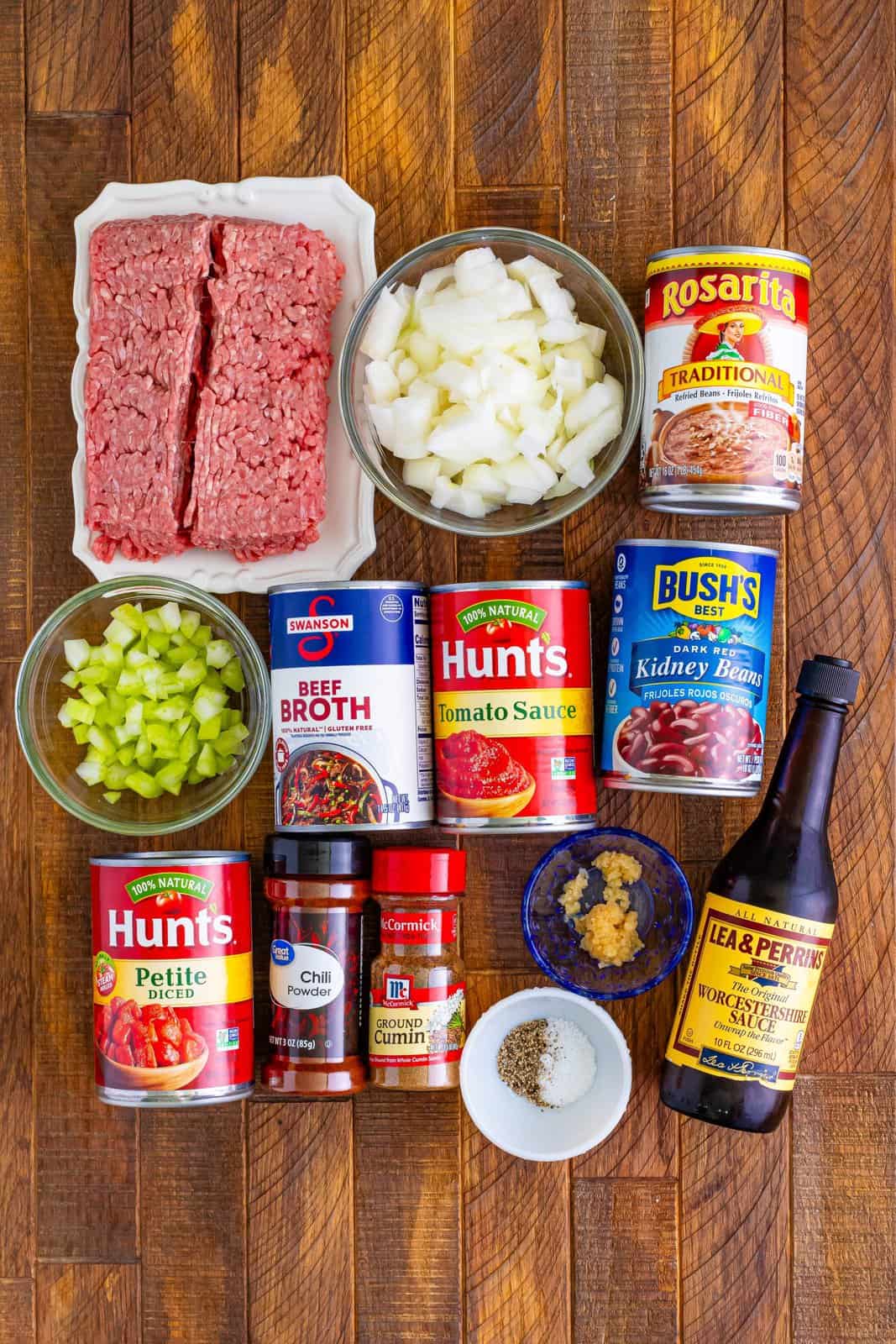 ingredients needed for chili: ground beef, celery, onion, chili powder, cumin, garlic, petite diced tomatoes, tomato sauce, dark red kidney beans, beef broth, refried beans, Worcestershire sauce, salt and pepper.