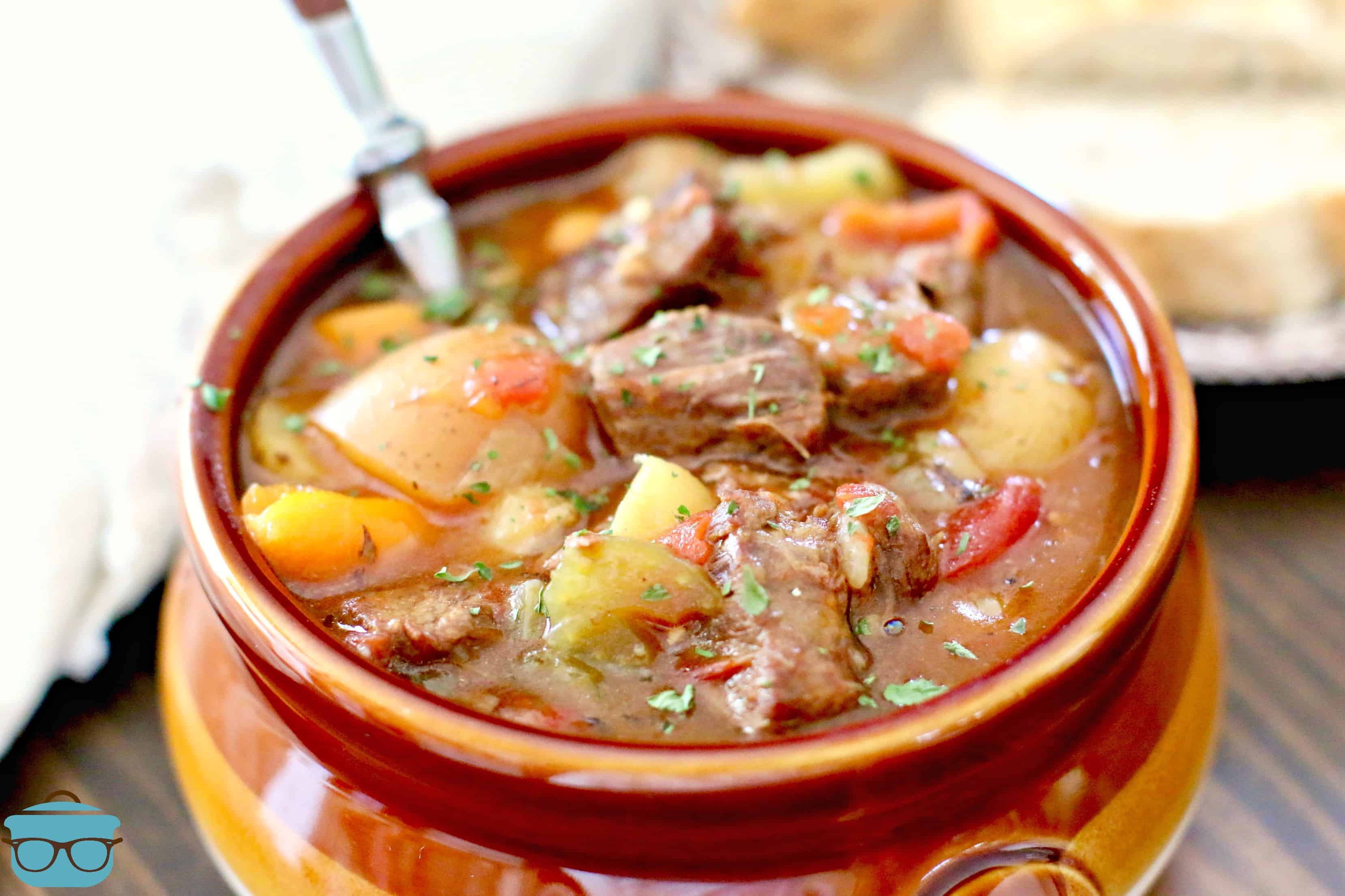 The Best Instant Pot Beef Stew in a bowl with spoon