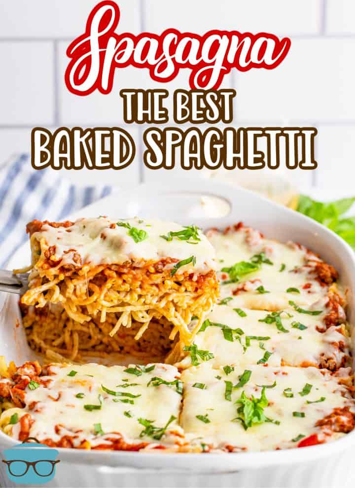 The Best Baked Spaghetti recipe (also known as Spasagna) slice of baked spaghetti shown being pulled out of the casserole dish with a spatula