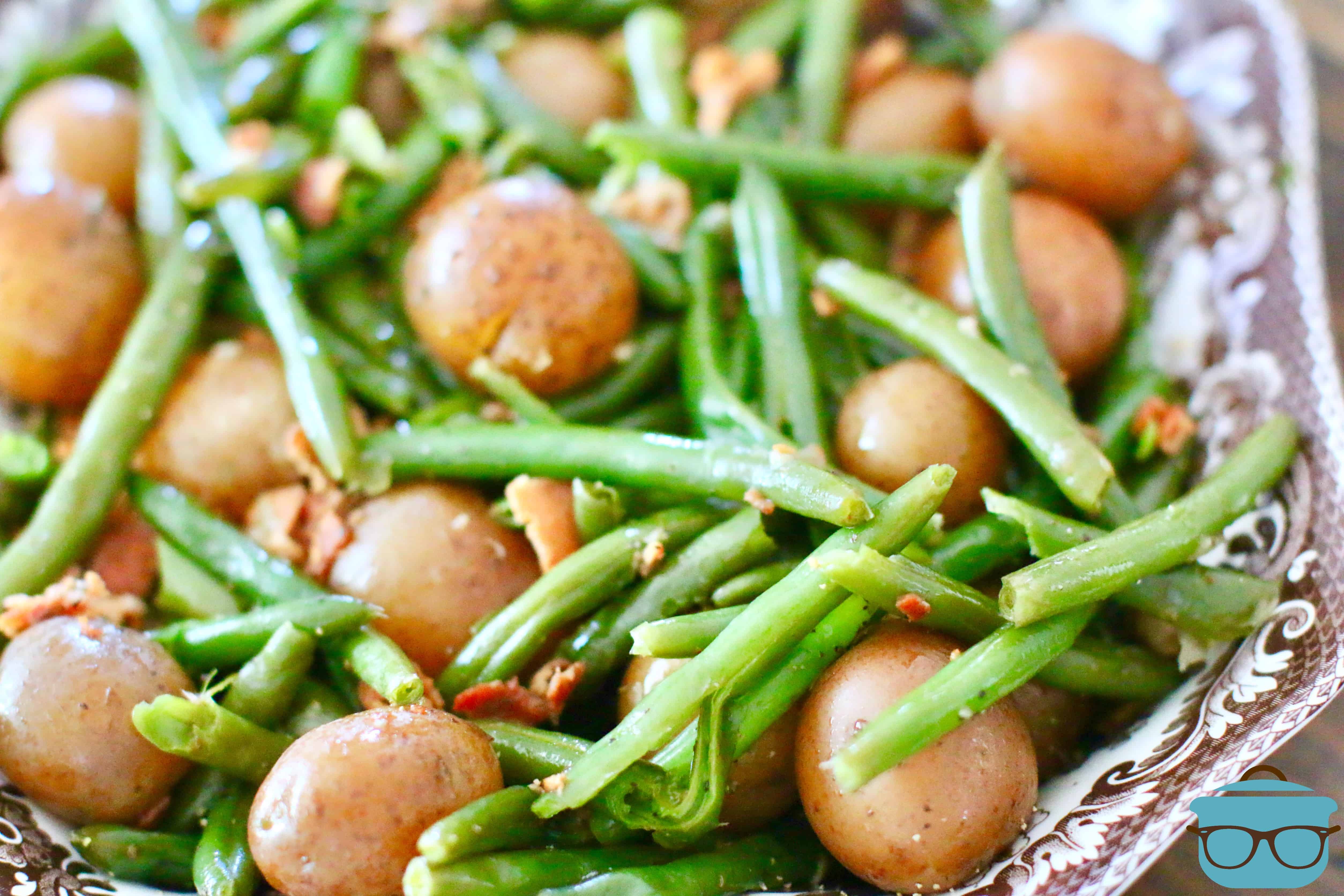 green beans, bacon and potatoes in a serving bowl.