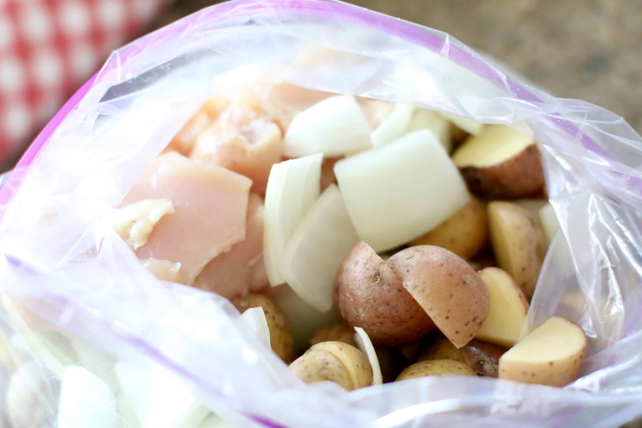 diced potatoes, onions and chicken in a large ziploc bag.
