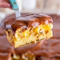 Boston Cream Poke Cake recipe from The Country Cook.