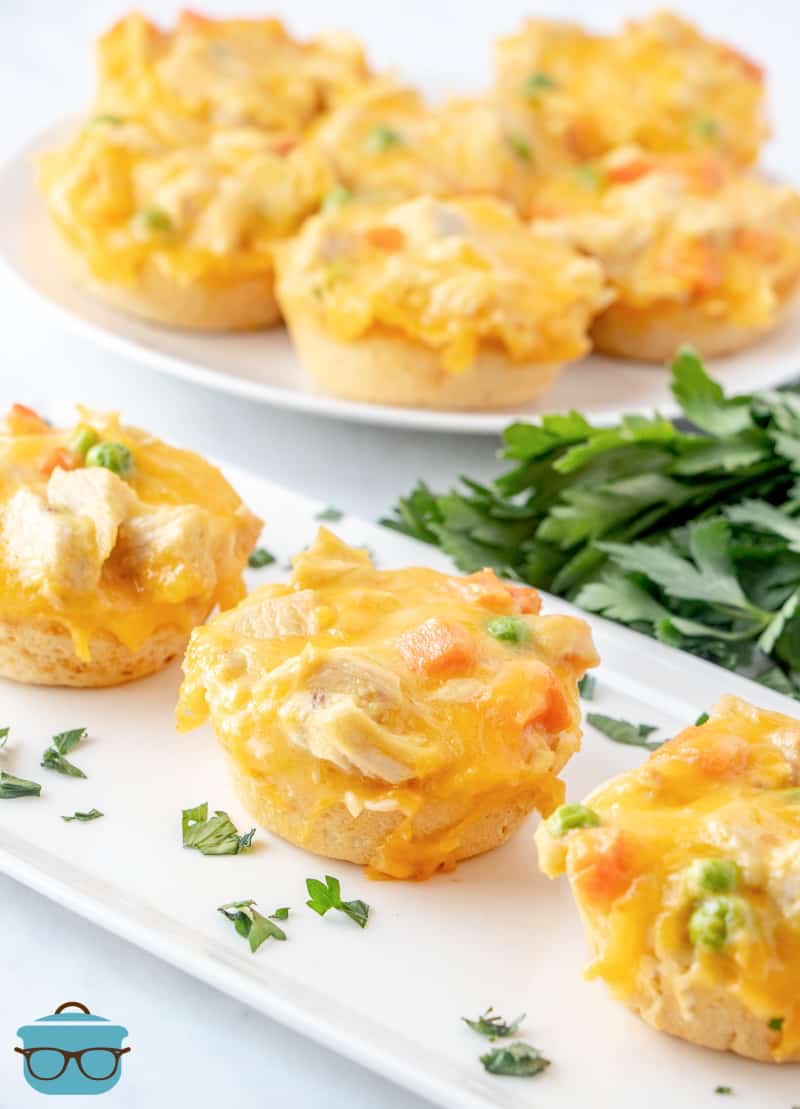 Chicken Biscuits Cups on a white tray topped with parsley flakes.