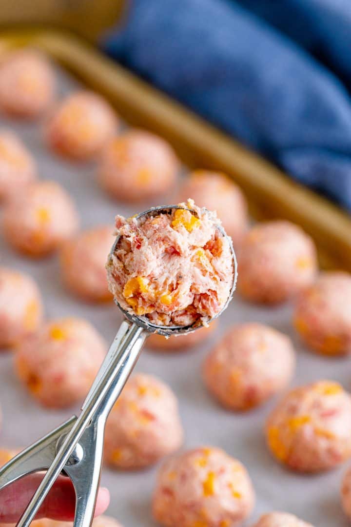 spring loaded scoop with cream cheese sausage mixture. 